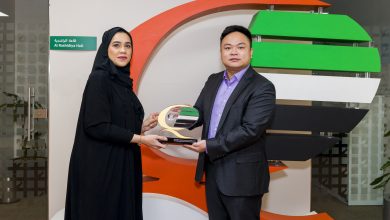 Shaikha Ahmad Al Bishri, Director Of Business Excellence Department Presents Jason Ou, President Of Hisense, Mena With The Dubai Quality Global Award