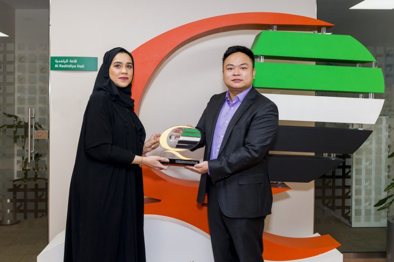 Shaikha Ahmad Al Bishri, Director Of Business Excellence Department Presents Jason Ou, President Of Hisense, Mena With The Dubai Quality Global Award