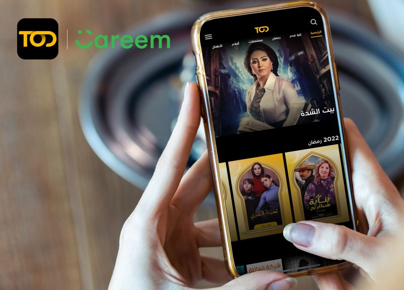 Young Woman's Hands Photographing Tempting Burger On Smartphone