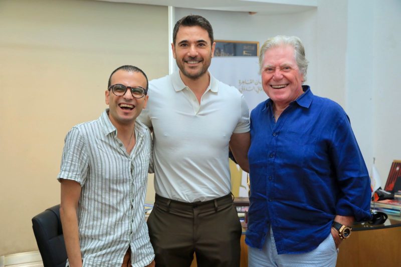 أحمد عز مع رئيس مهرجان القاهرة السينمائي الدولي